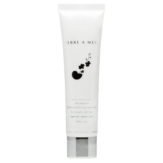 Terre A Mer Pure Hydration shampoo tube, white with black flower logo