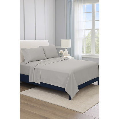 Grey double bed sheet set on bed, with pillowcases and flat sheet