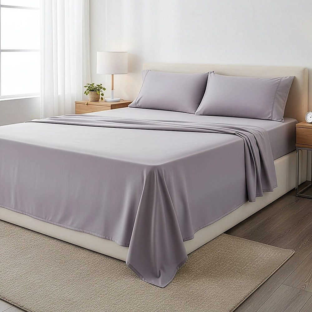 Grey queen bed sheet set with pillowcases and a matching flat top sheet