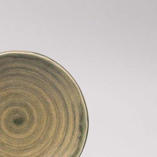 Washed fern saucer, 14 cm, close-up of olive concentric rings on ceramic surface