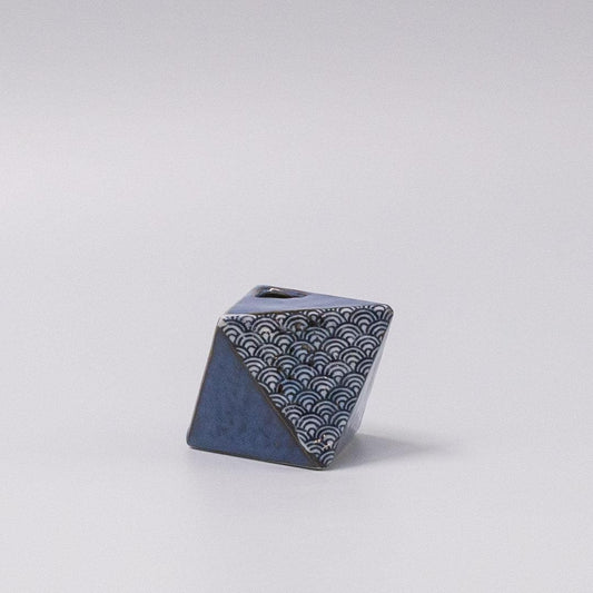 Triangular indigo wave vase with white scallop pattern and open top