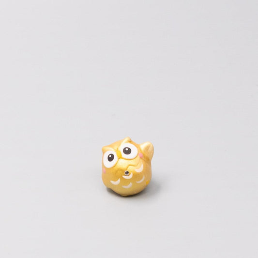Gold owl figurine with painted eyes and wings, small decorative okimono