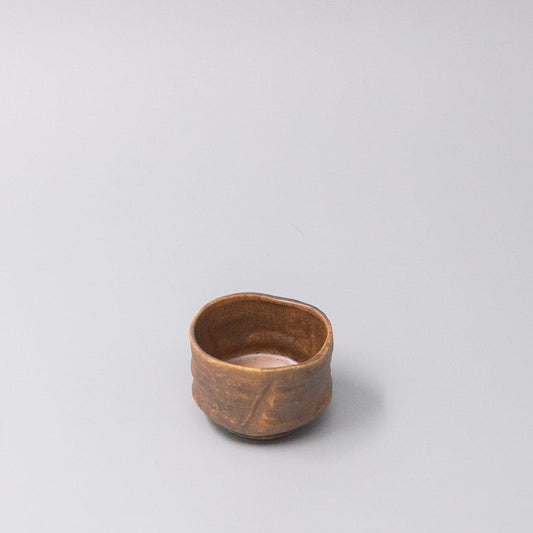 Ceramic sake cup, small round bowl in ochre-brown glaze with smooth sides