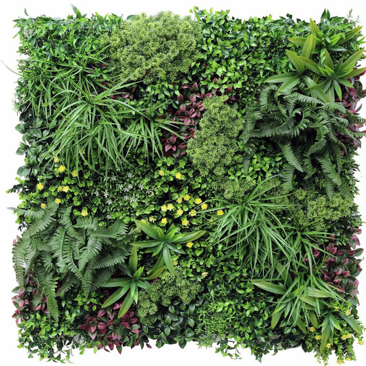 Vertical garden wall panel covered in dense assorted green plants and small purple blooms