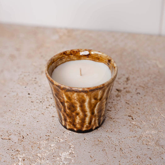 Amber ceramic scented candle with white wax and small wick