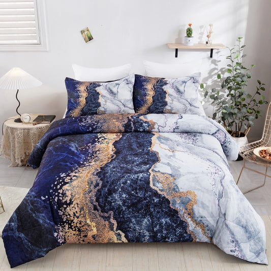 King-size comforter set with blue marble print, gold and white accents, two matching shams
