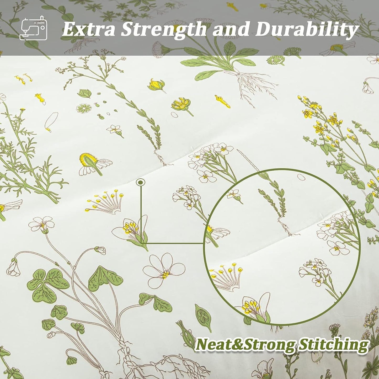 Close-up of white comforter fabric with thin green stems, leaves, and small stitched pattern