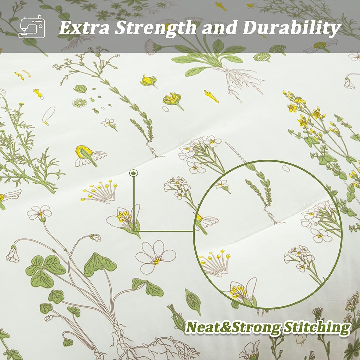 Close-up of white comforter fabric with thin green stems, leaves, and small stitched pattern