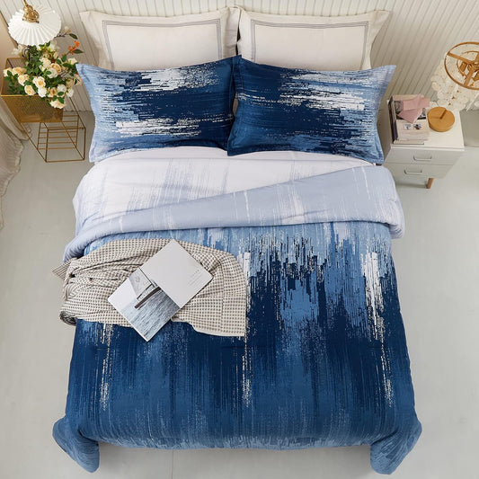 King bedding set with blue ombre comforter and two matching rectangular pillows