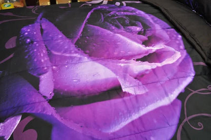 Purple rose comforter detail on black fabric with swirling vine accents