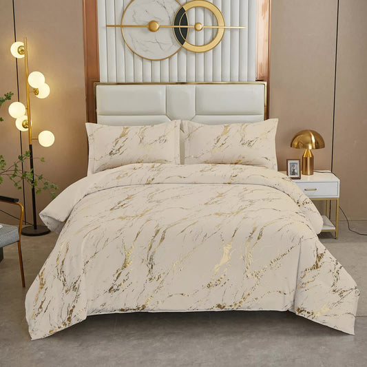 White comforter set with gold marble-style brushstroke pattern and matching pillowcases
