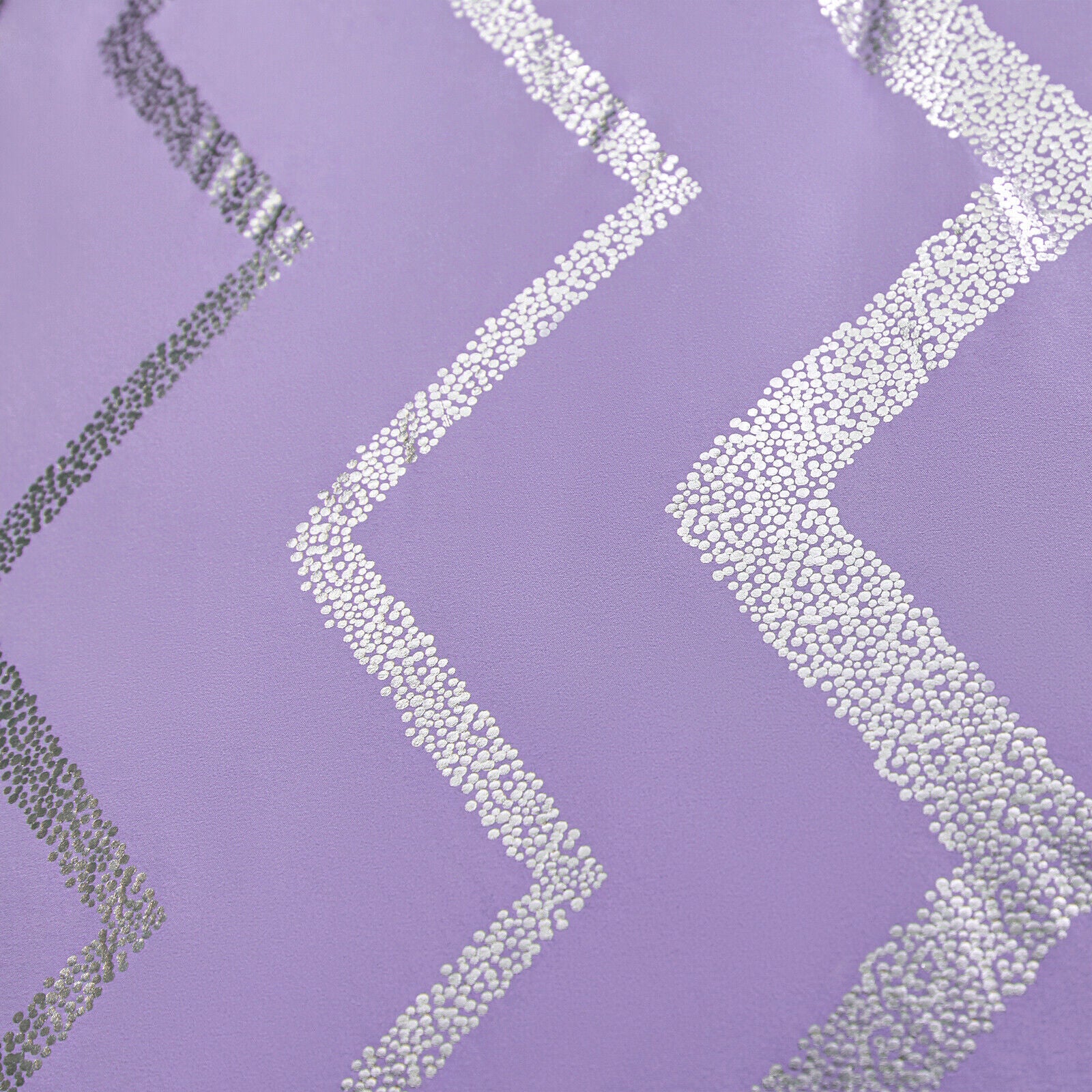 Lavender fabric close-up with silver sequin chevron stripes
