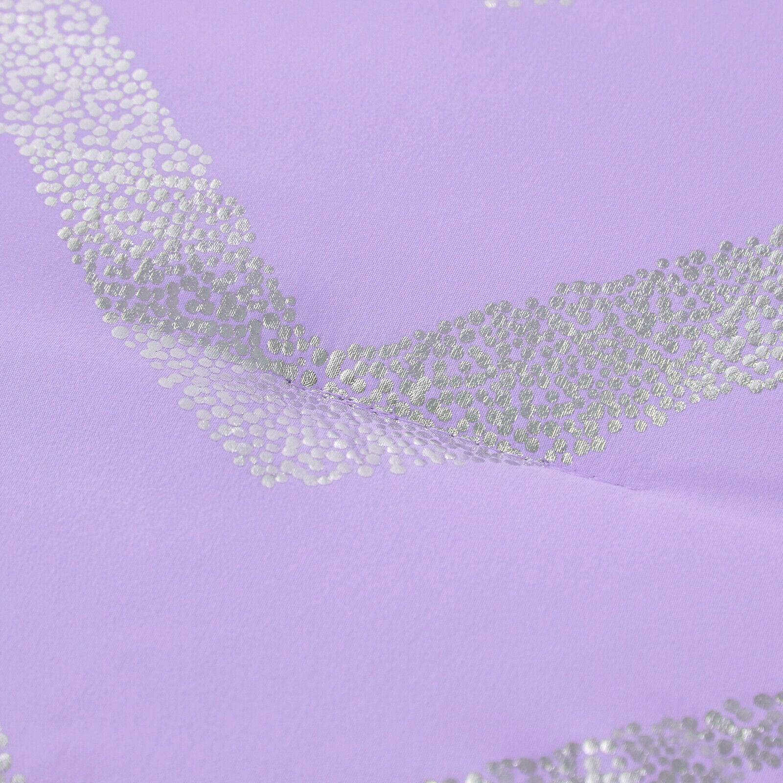 Lavender fabric close-up with silver sequin zigzag accents