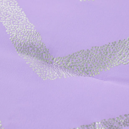 Lavender fabric close-up with silver sequin zigzag accents