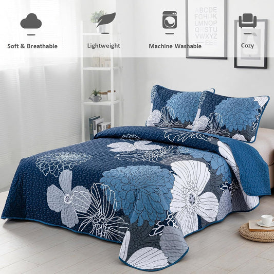 Blue king comforter set with quilted floral design and two matching pillow covers