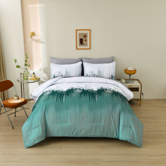 King comforter set with teal ombre-style stripe pattern on comforter and two pillowcases