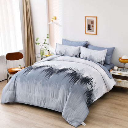 King comforter set with light blue comforter and white/black patterned pillowcases