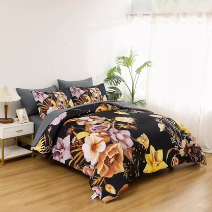 Quilted comforter set with black floral print, gray pillows, and matching duvet