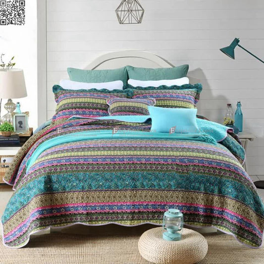 Teal boho bedspread quilt with striped floral pattern and ruffled trim, plus pillowcases