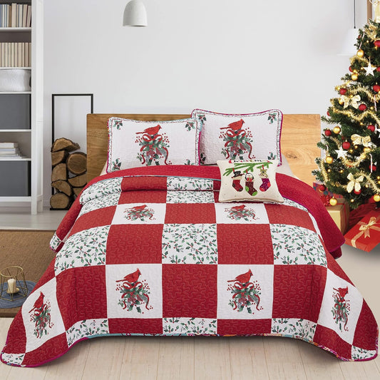 Red and white patchwork Christmas quilt set with bird and floral motifs, stitched border