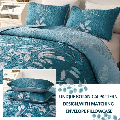 Teal quilt coverlet set with botanical pattern and two envelope pillowcases