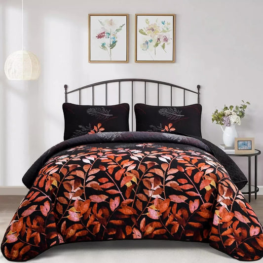 Quilted bedspread and pillowcase set, black with orange and pink leaf pattern