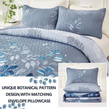 Blue botanical quilted coverlet with two matching pillow shams, leaf floral pattern