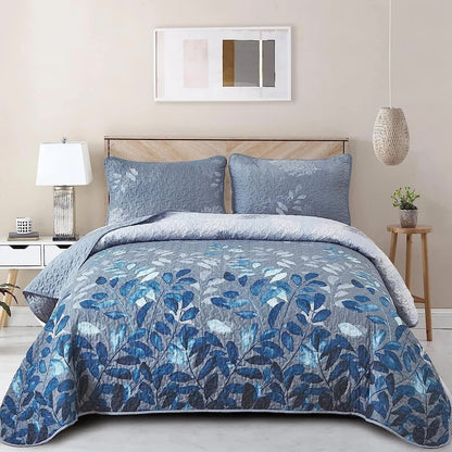 Blue floral leaf quilted coverlet set with two pillow shams, botanical pattern