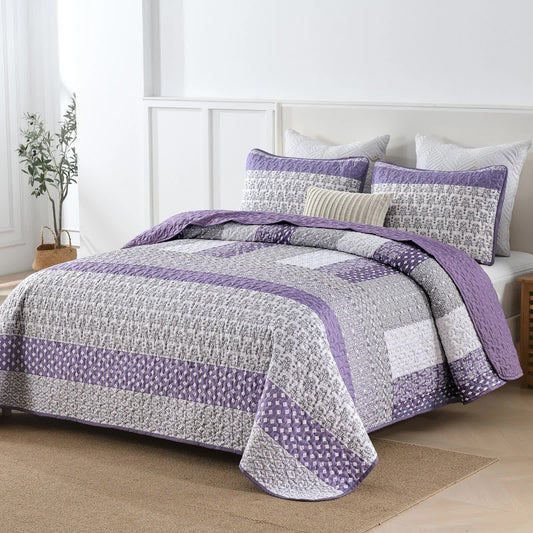 Quilted bedspread with purple and white stripes and patterned panels, plus matching pillowcases