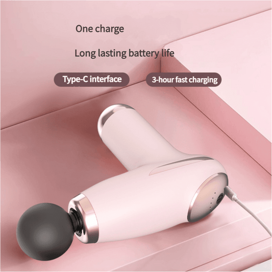 Pink mini fascia gun with round black head and visible side charging port