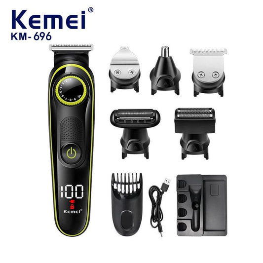 Kemei KM-696 electric hair clipper with multiple trimming guide attachments