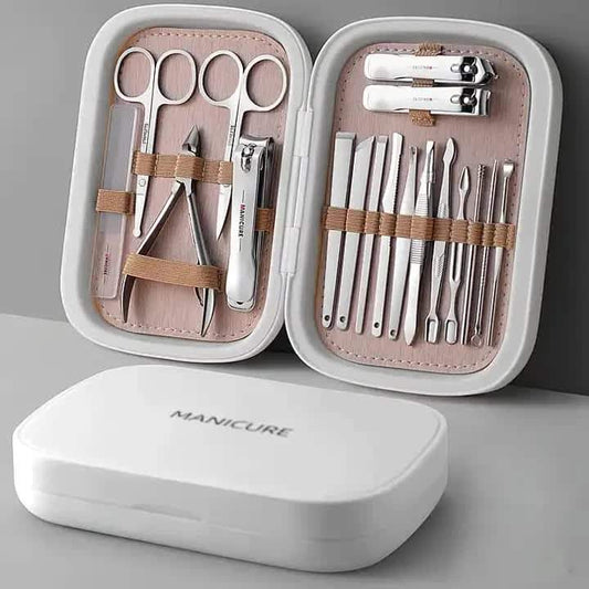 Manicure and pedicure tool set in split case with stainless nail clippers and files