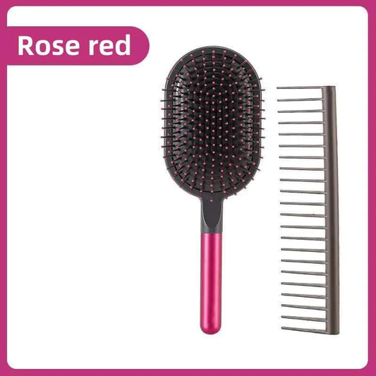 Air cushion paddle brush with pink handle and wide-tooth comb, black bristles