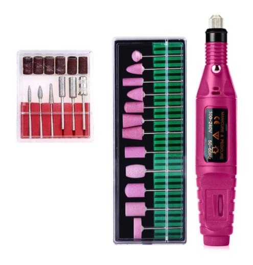 Electric nail drill kit with pink pen and assorted grinding bits in a case