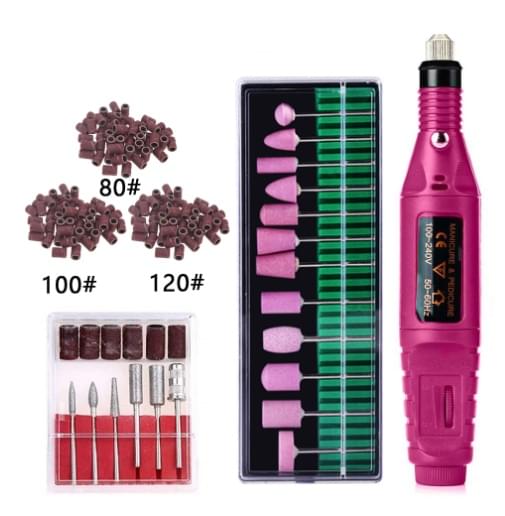 Nail drill kit with pink handle, sanding bits, discs, and grinding attachments