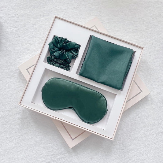 Dark green satin eye mask, scrunchie, and matching pillowcase gift set