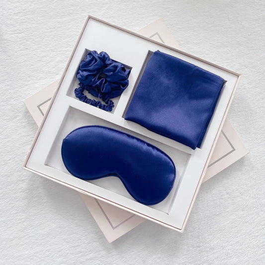 Navy satin sleep mask set: pillowcase, eye mask and hair scrunchie in box