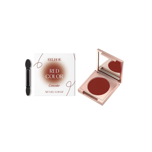 Red concealer compact with open pan and applicator, plus product box