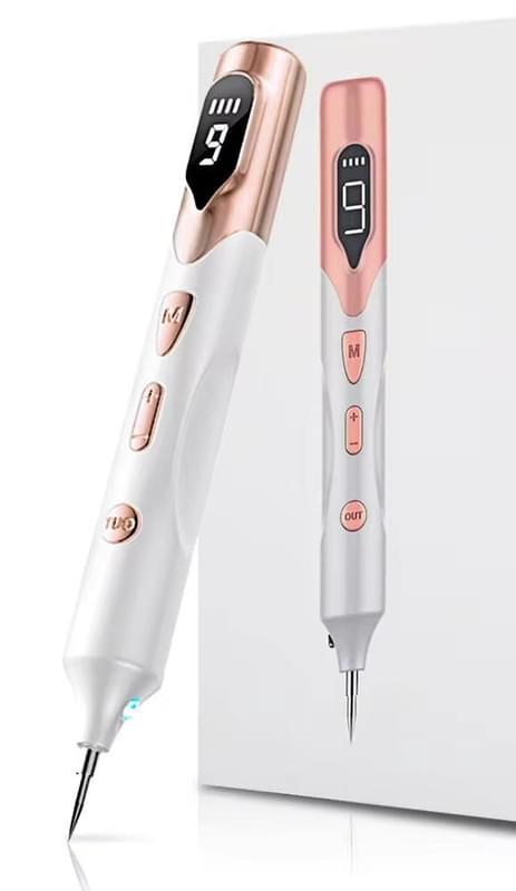 Gold and white skin tag remover pen with pointed tip and charging cord