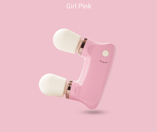 Pink dual-head mini massager with two rounded white pads and a control button