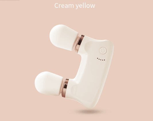 Cream yellow dual-head mini massager with two rounded silicone tips