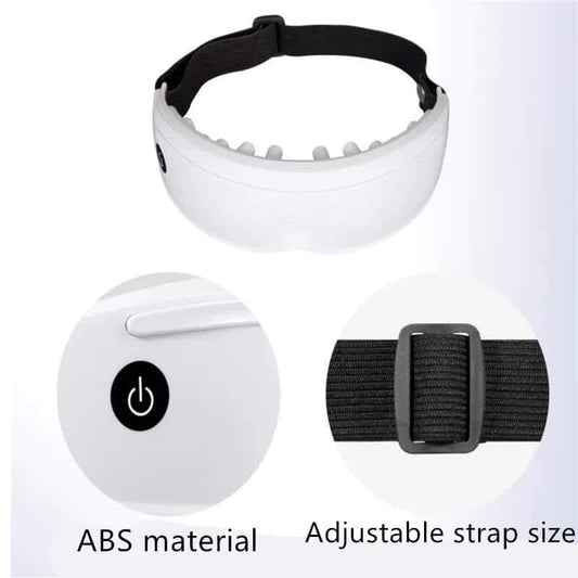 White eye massager with black adjustable strap and control button.