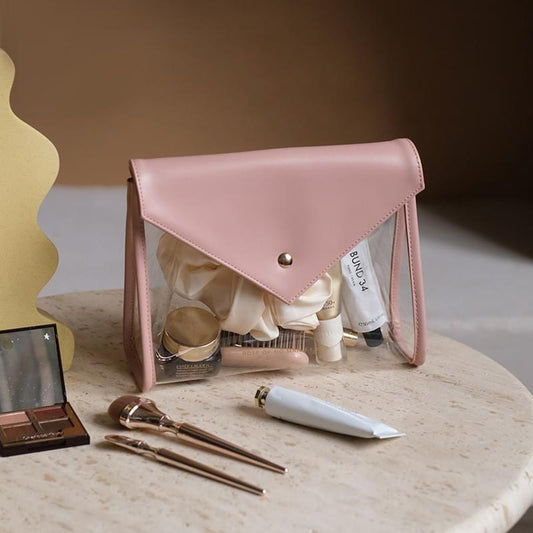 Pink envelope makeup bag with clear TPU window, snap flap and short handle straps