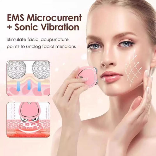 Pink facial massager with silver rollers held to cheek