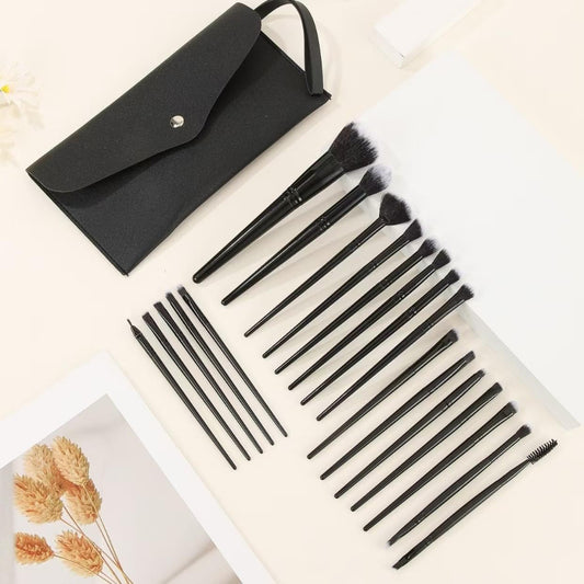 Black makeup brush set with travel pouch and assorted face and eye brushes