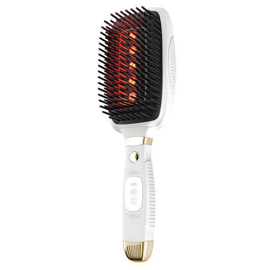 White scalp massage comb with black bristles and glowing red LED light on teeth