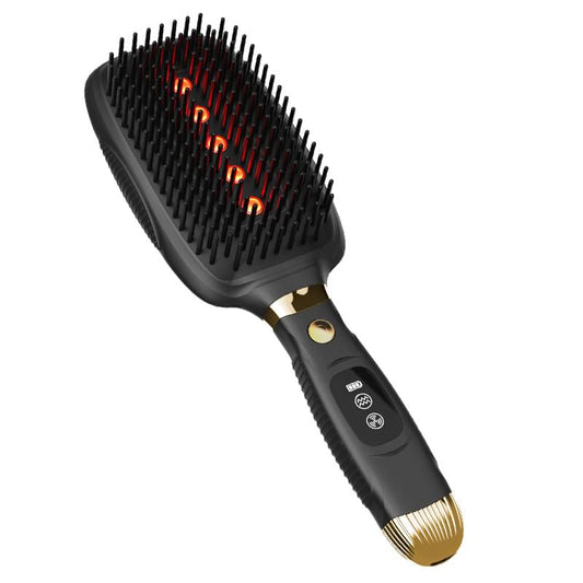 Black scalp massage comb with red light beads, ergonomic handle and gold accents
