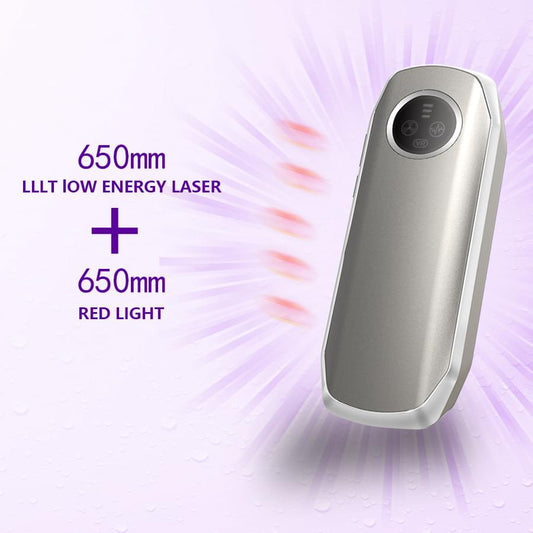 Electric scalp massage comb, silver handheld device with control panel on top.