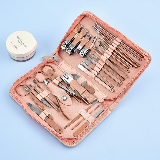 Manicure and pedicure tool kit in pink zip case with stainless steel instruments