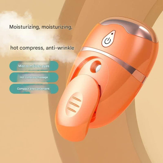 Orange handheld hot-compress eye massager with metal top and curved facial contact